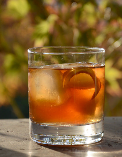 Glass of Wine Forest Candy Cap Old Fashioned on the rocks