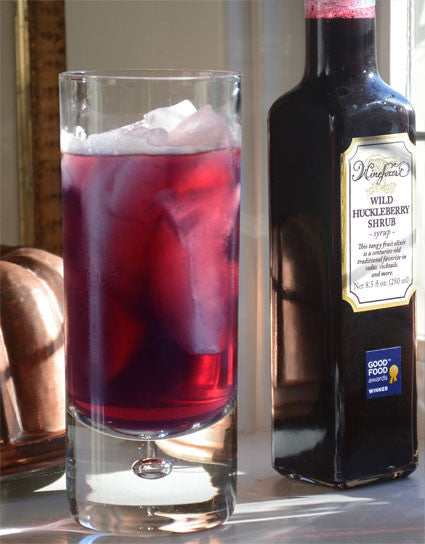 Tall glass of Wine Forest Huckleberry Roffignac Cocktail made with Wine Forest Award-Winning Huckleberry Shrub